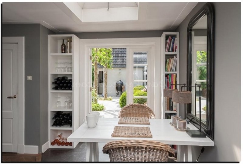 boogspiegel-zwart-boven-eettafel