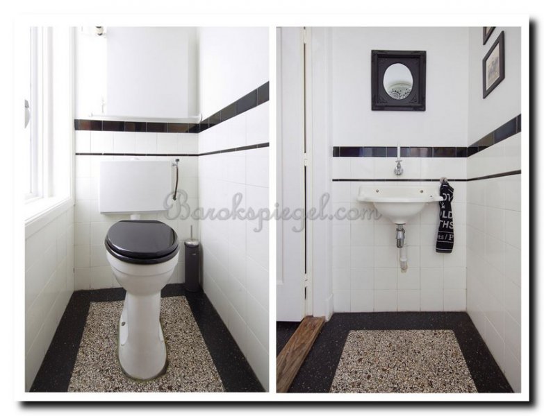 zwarte-ovale-spiegel-in-toilet