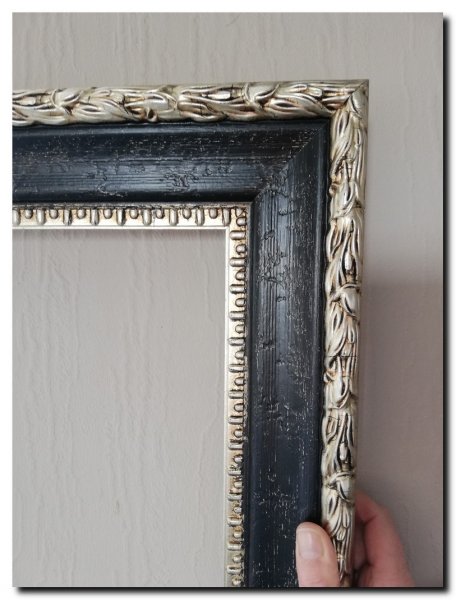 detail-hoek-ornament-barok-spiegel-zwart-met-zilve