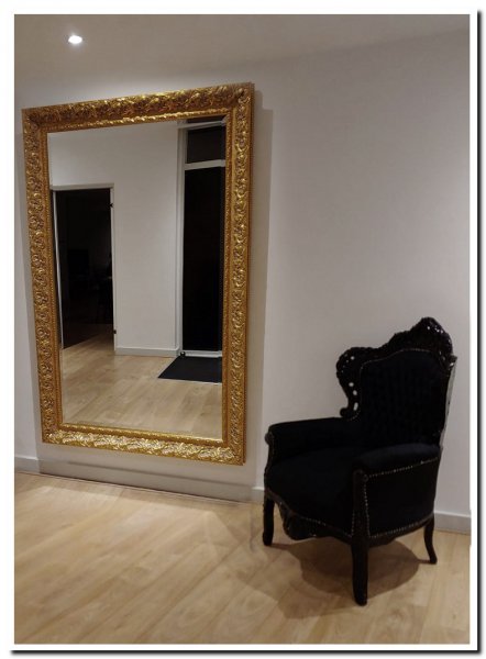 grote-gouden-wandspiegel-in-hal-barok
