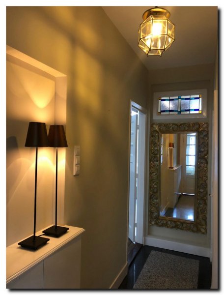 grote-halspiegel-goud-in-huis-begin-1900