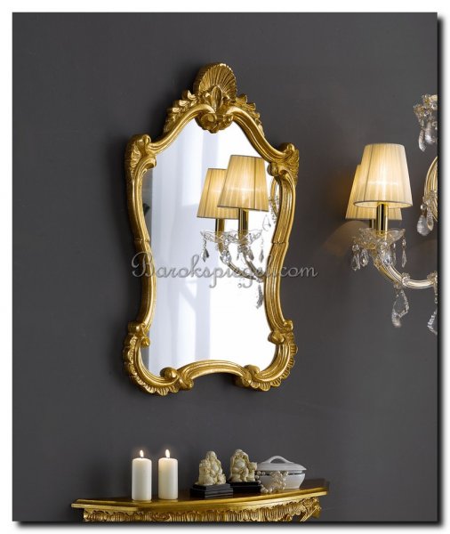 kuifspiegel-sierspiegel-goud-op-donkere-muur-spieg